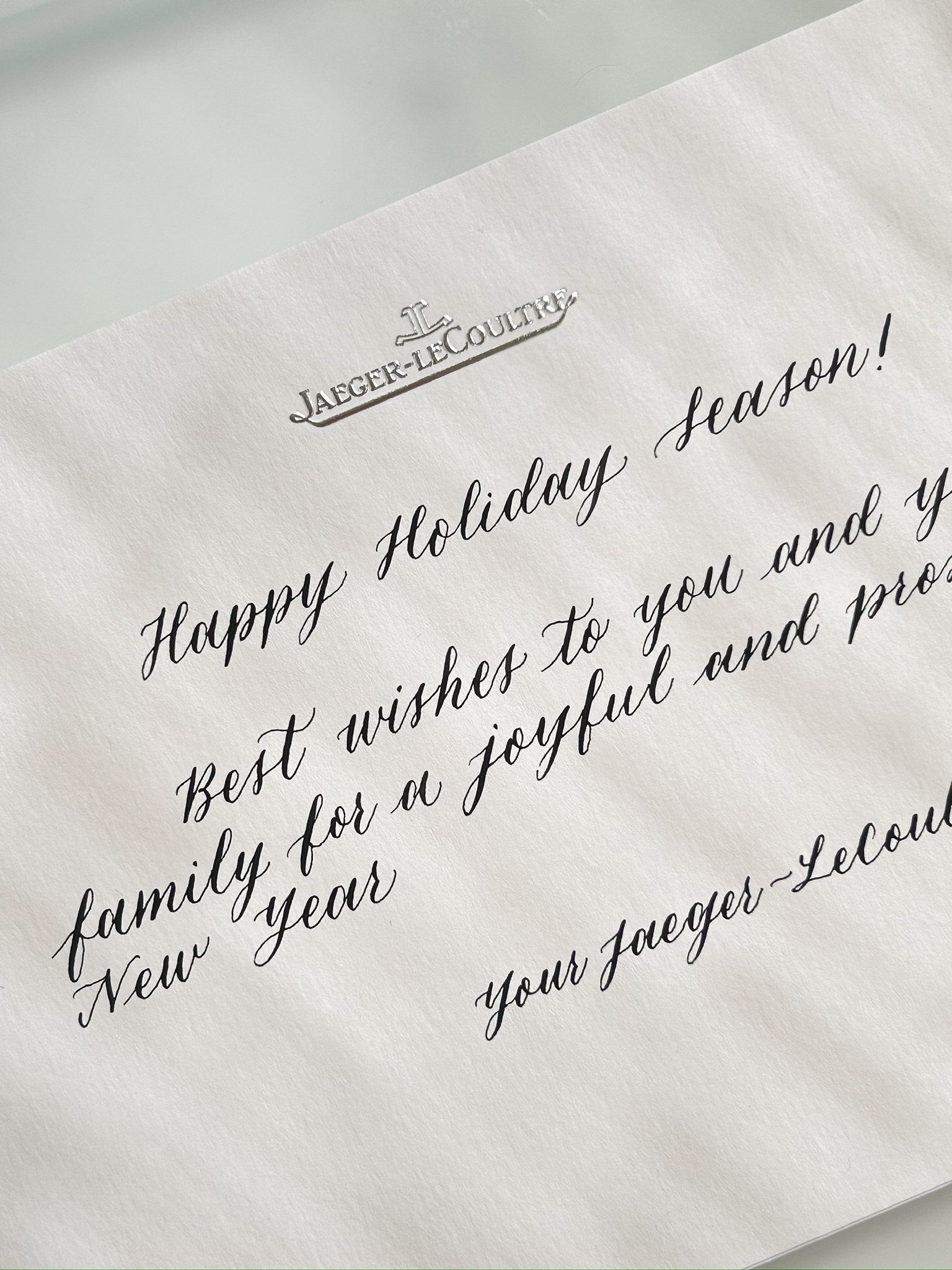 Calligraphy on Jaeger-LeCoultre Holiday Season card — Lettering in the Cloud